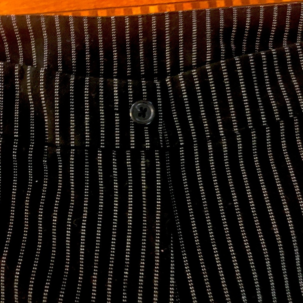 Black & white pinstripe pants with front zip closure